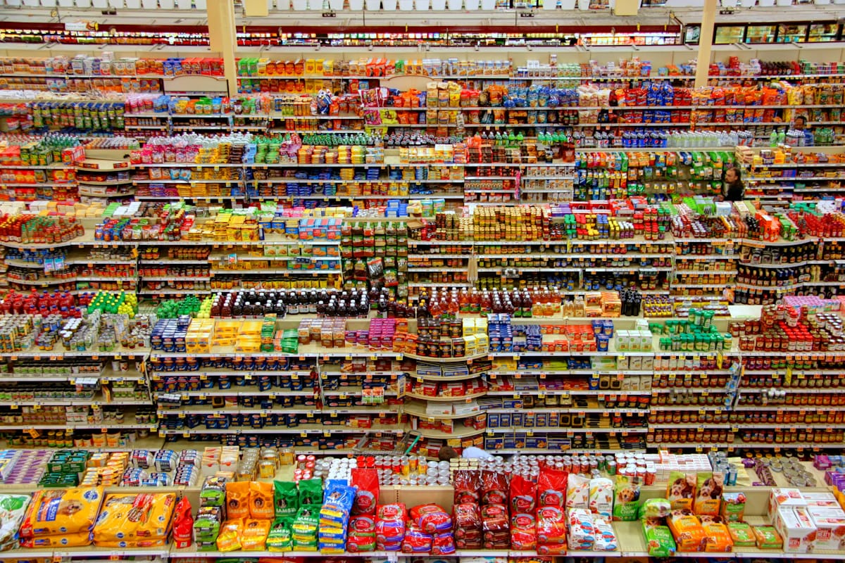 A supermarket seen from above, shelves packed with thousands of products